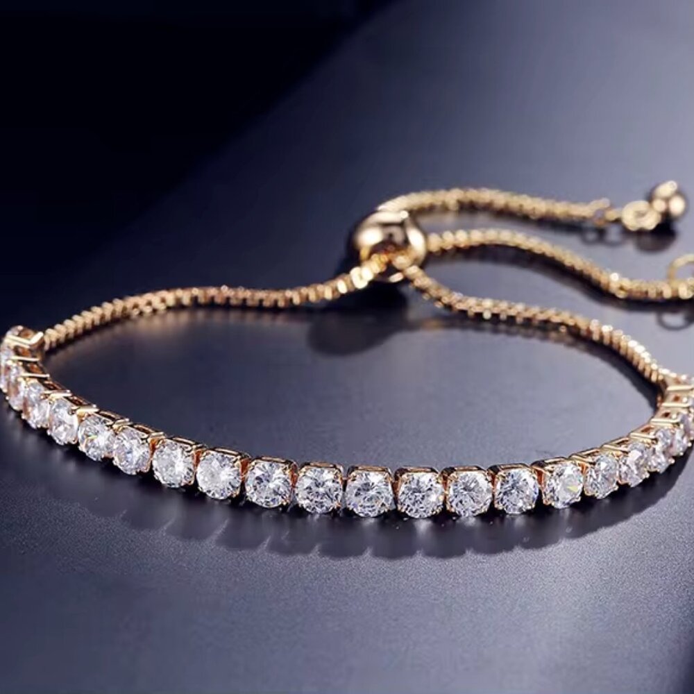 14k yellow gold plated lariat style bracelet with simulated diamonds